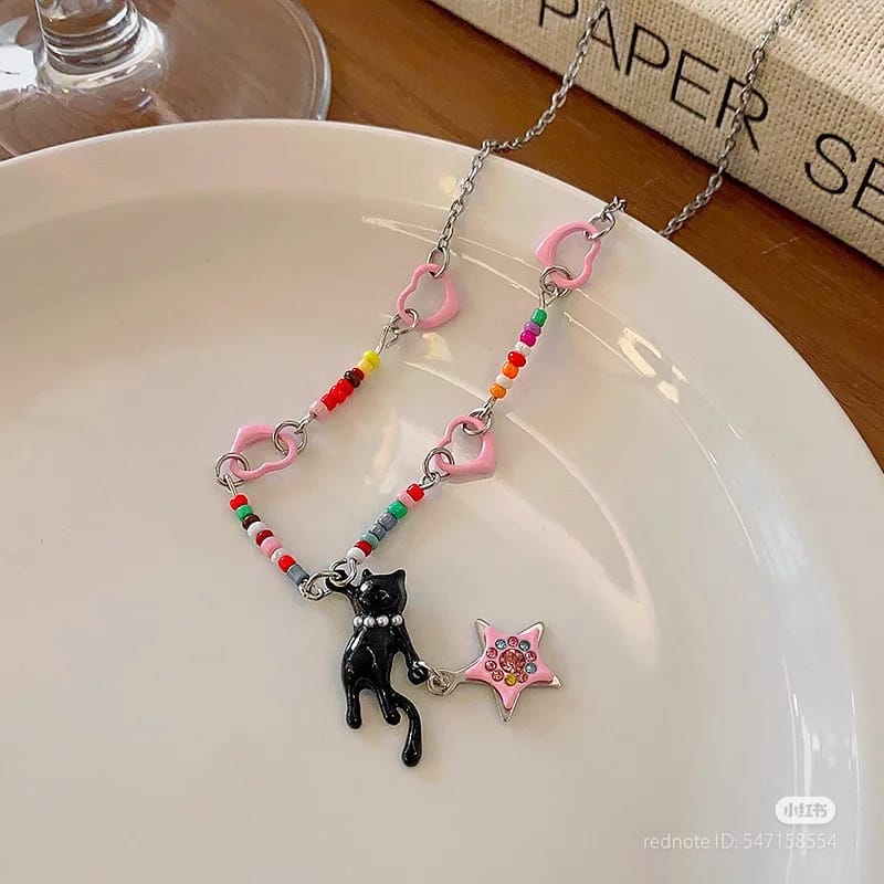 Black cat pink heart necklace
