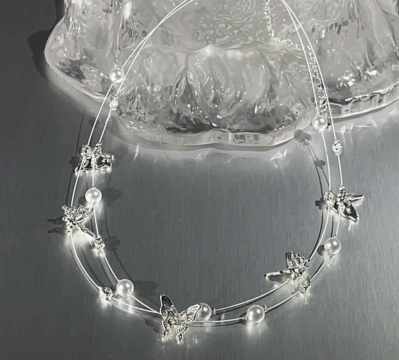 Butterfly pearl necklace