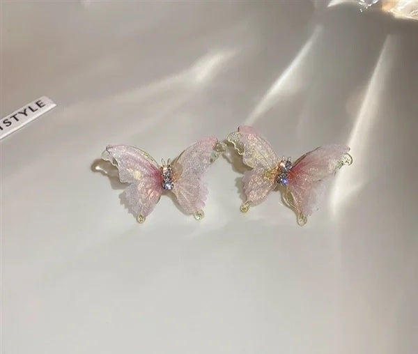 Pink butterfly earrings