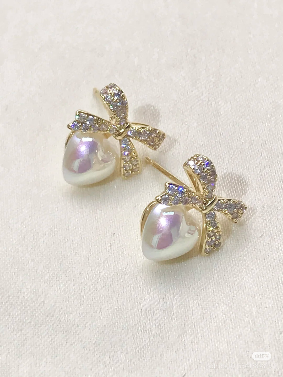 Dimond ribbon heart earrings