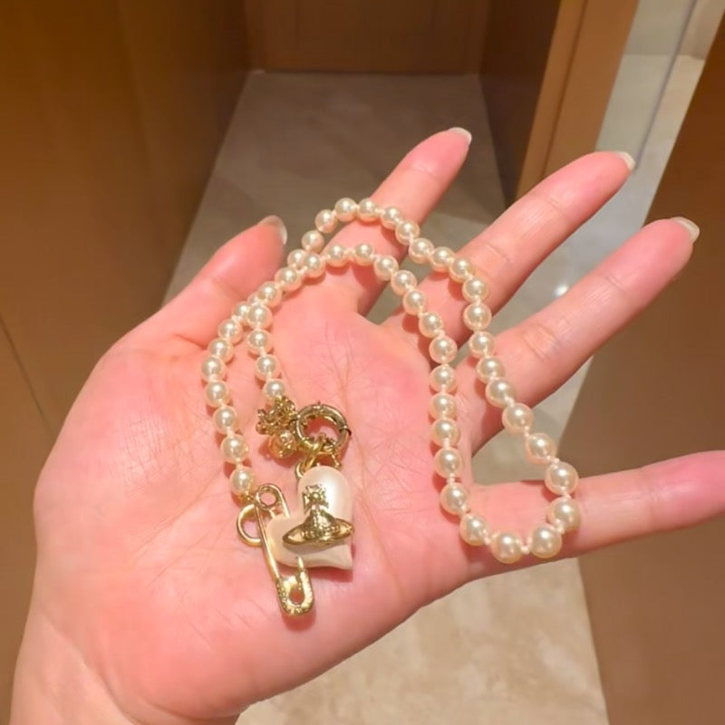 VW pearl heart necklace