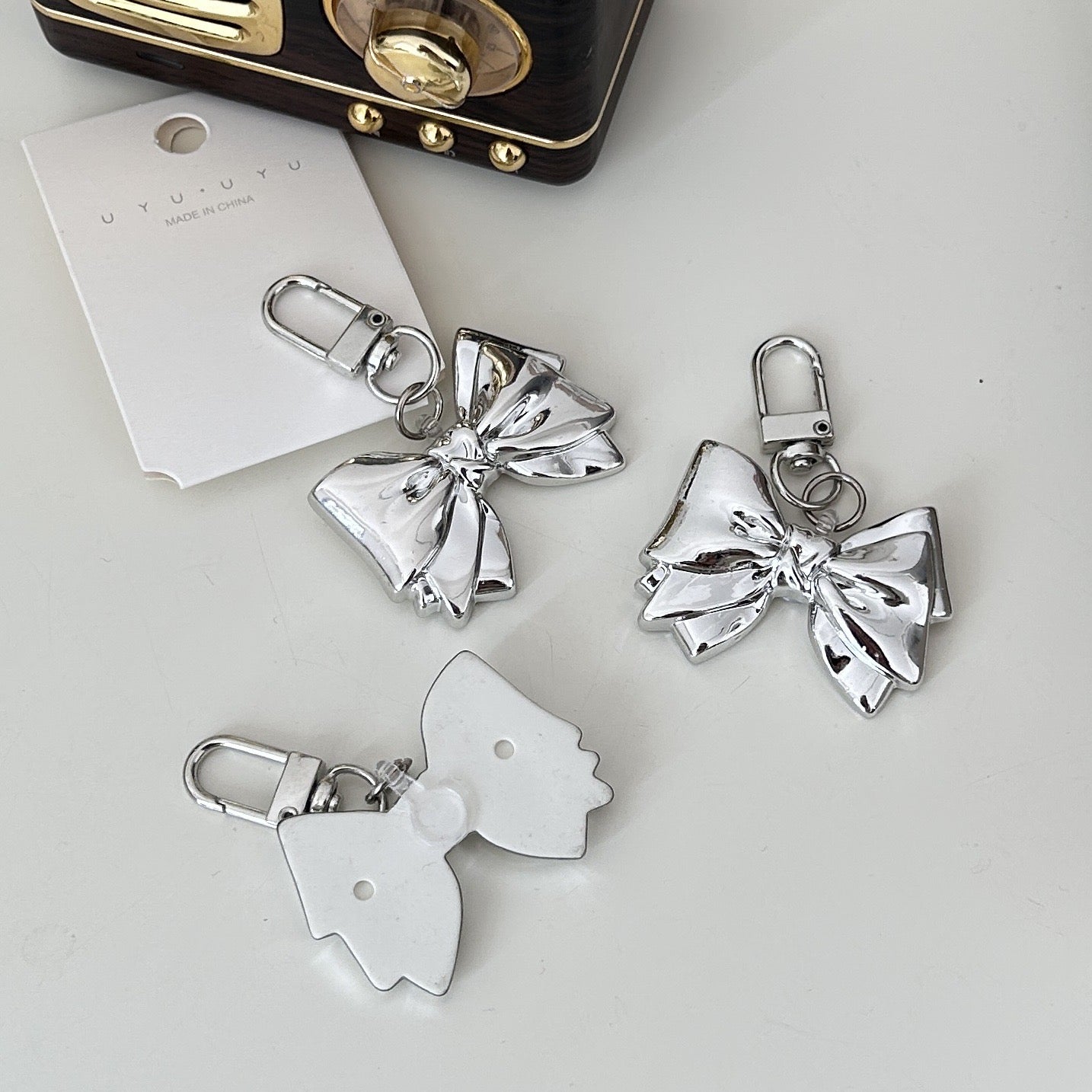 Silver bow keychain