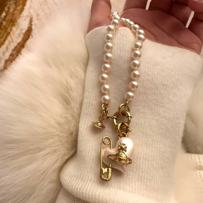 VW pearl heart necklace