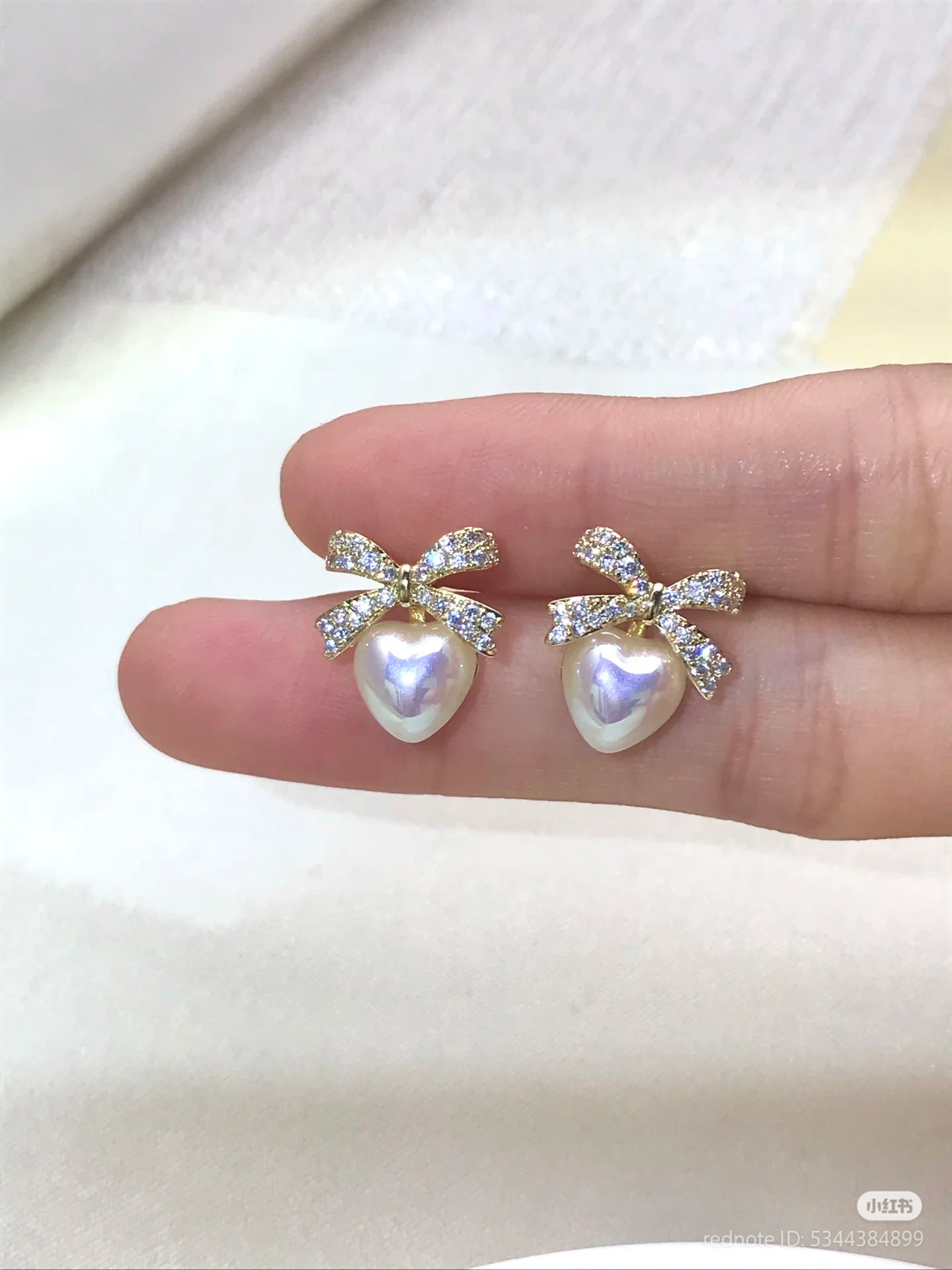 Dimond ribbon heart earrings