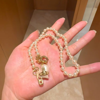 VW pearl heart necklace