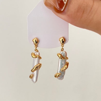 Gold pearl earrings